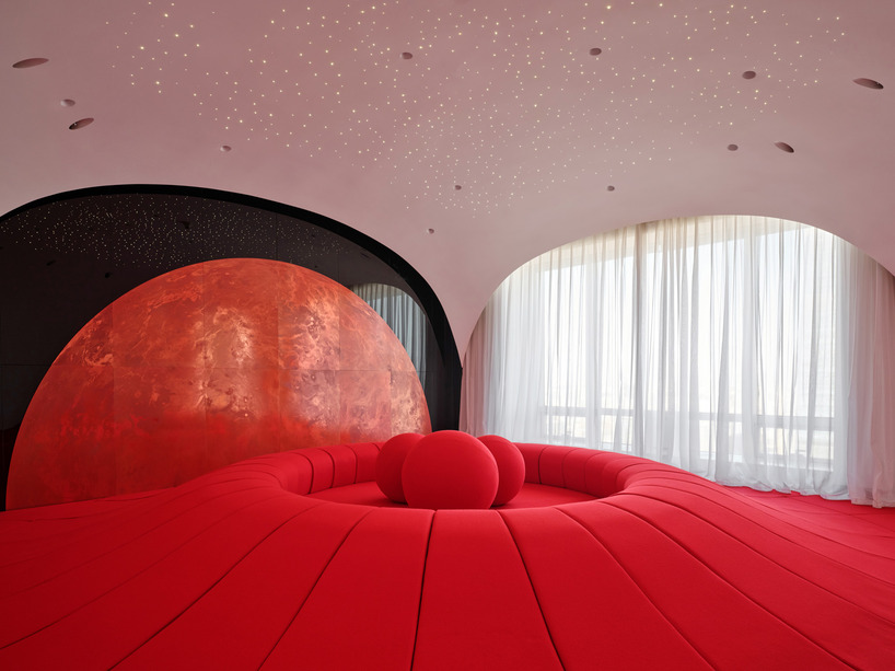 copper planet installation and red undulating seating anchor venus lounge by asap/ in beijing post thumbnail image